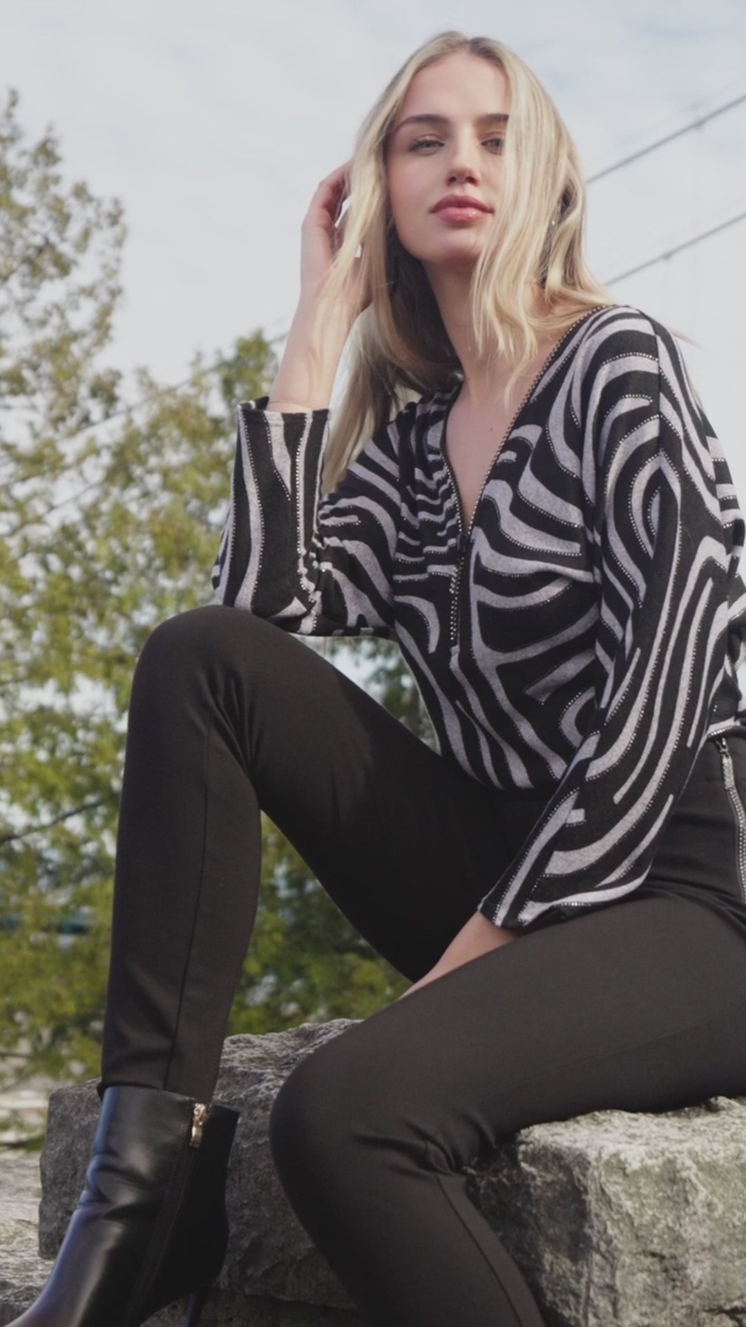 Haut zébré à fermeture éclair